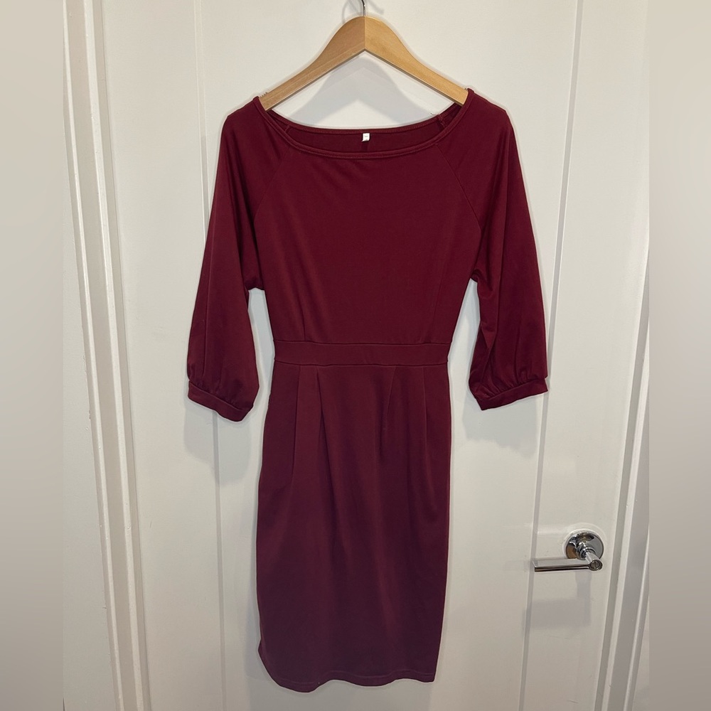 Woman’s large, maroon dress. Perfect for fall with pockets!